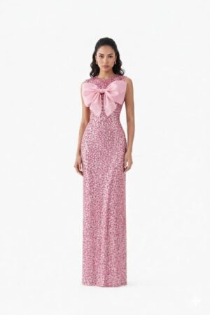Pink sequin evening gown for women with bow detail and floor-length design